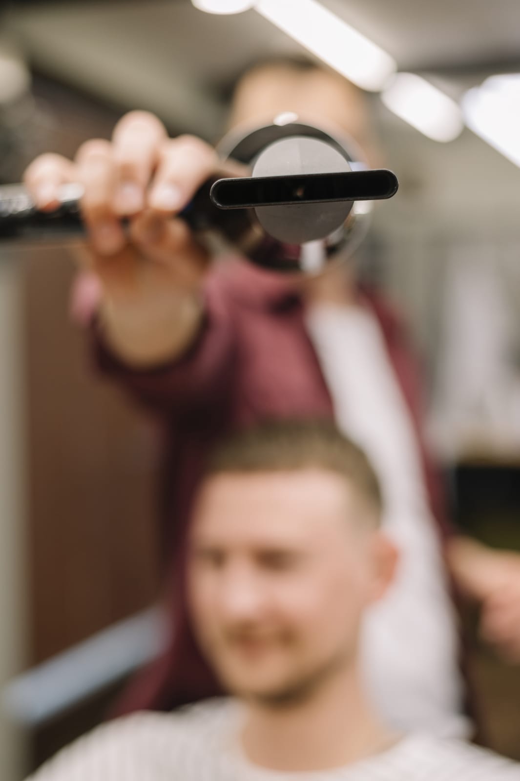 Hair dryer and salon tools styled for Vibe's favorite at-home products section.