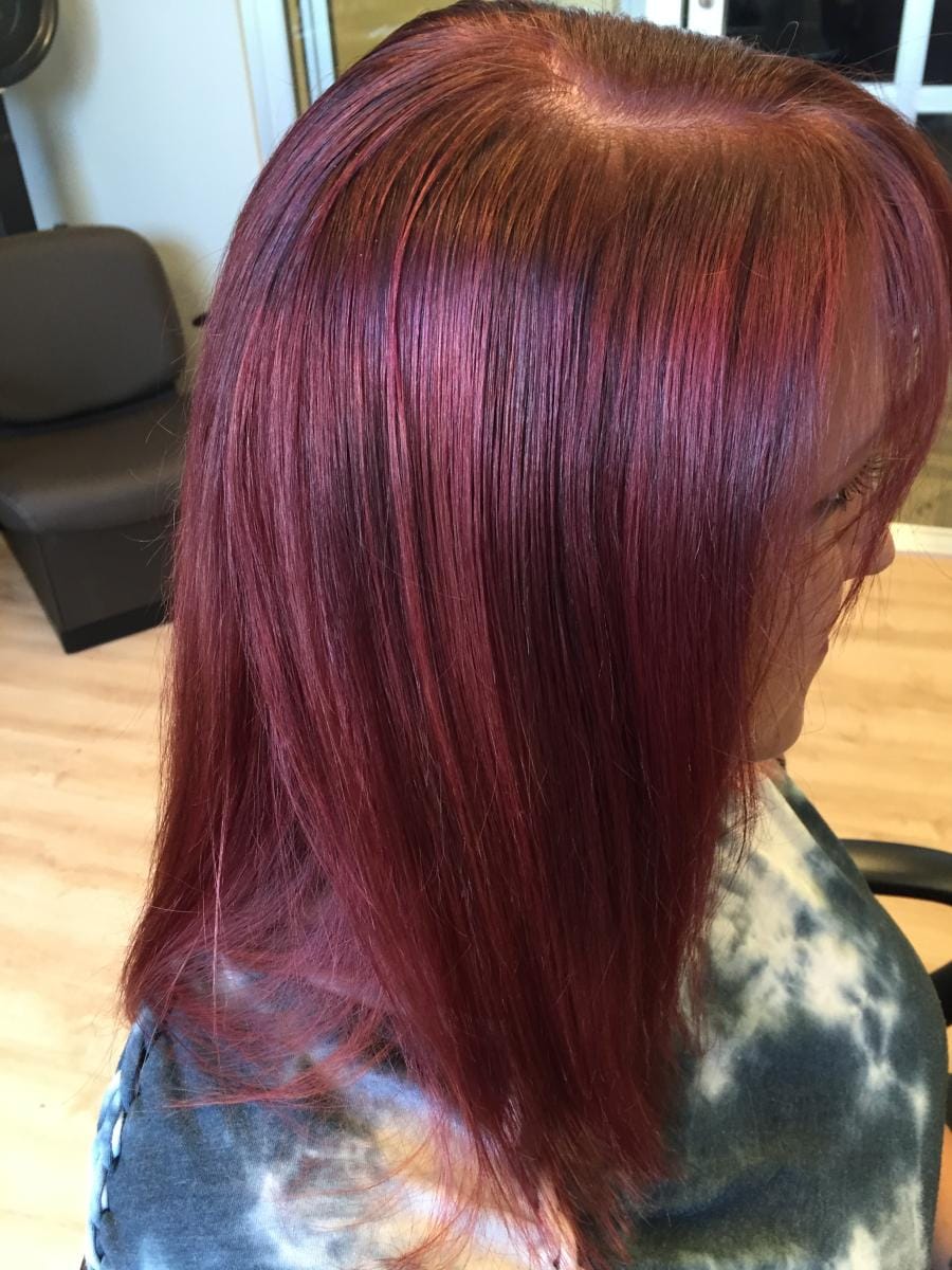 Styled salon result photographed after finishing touches.